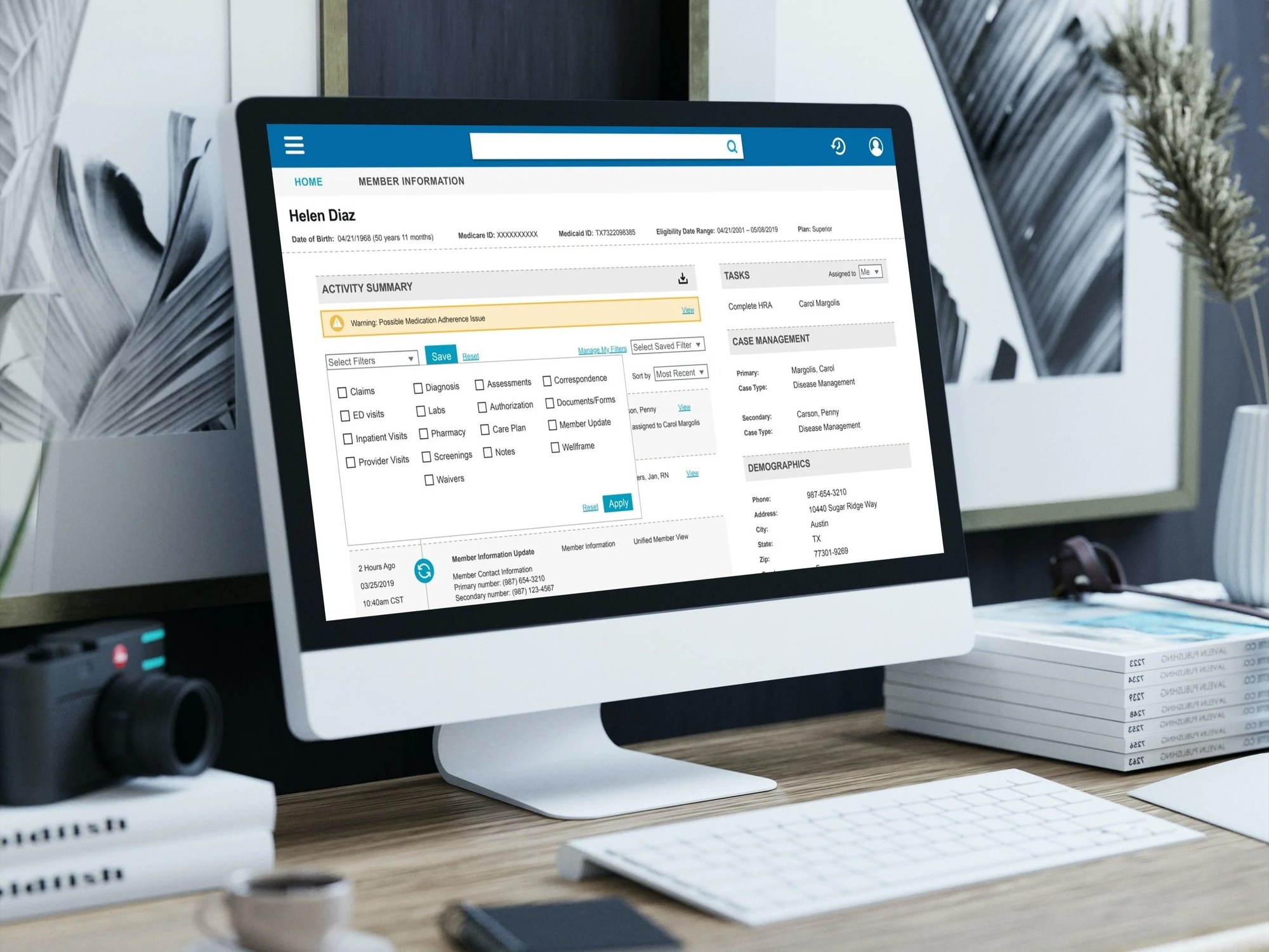 TrueCare case management interface displayed on a desktop monitor